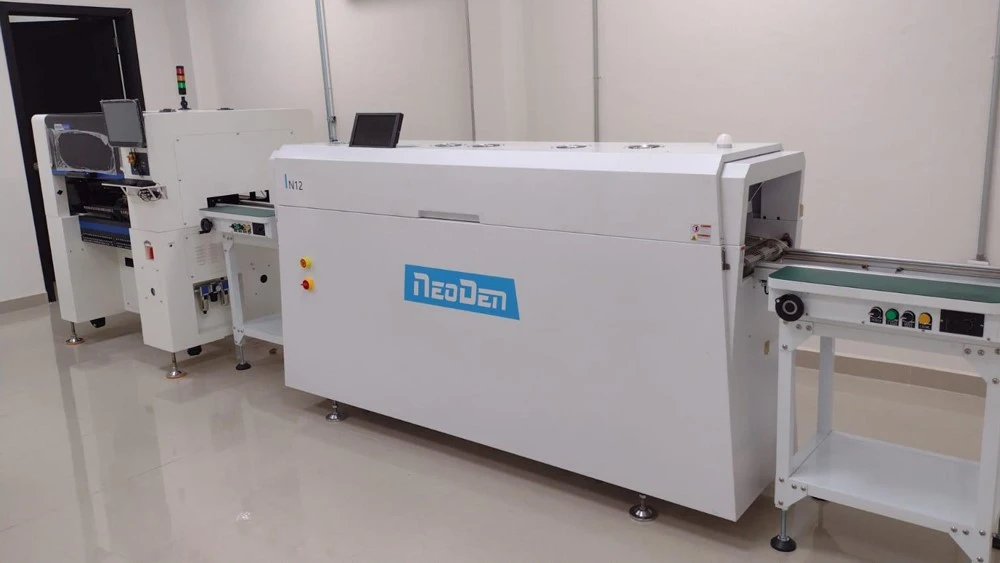 NeoDen IN12 Reflow Soldering Machine Operating in Industrial Electronics Plant NeoDen IN12 Reflow Soldering Machine Operating in Industrial Electronics Plant